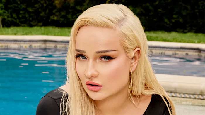 Kim Petras was photographed by Yu Tsai in Los Angeles. Swimsuit by LILY&ROSE. Earring by Jennifer Meyer.